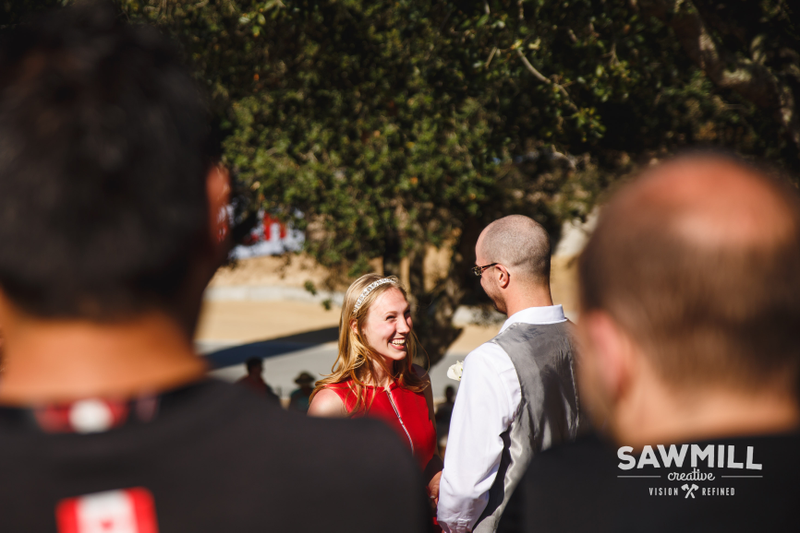 Illustration for article titled Surprise Marriage At Laguna Seca's Corkscrew Is The Cutest Thing Ever